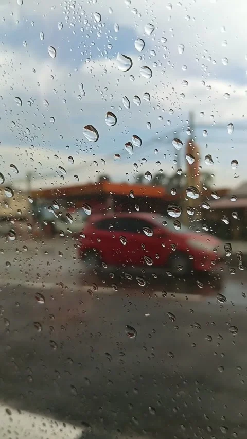 Closeup of raindrop texture at car window after rain Stock Footage 320335917