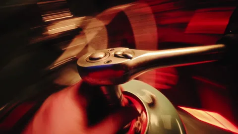CloseUp of Ratchet Tool in Action by car mechanic, locksmith. POV shot with Stock Footage 302828674