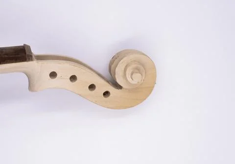 Closeup Raw Scroll of Violin put on white background Foto stock