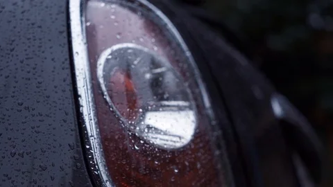 Closeup on a rear LED light of a car after the rain Stock Footage 112796030
