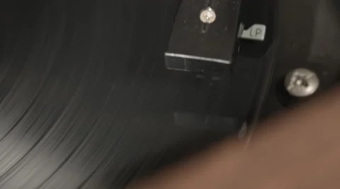 Closeup of Record Spinning on Record Player from Above Stock Footage 61709419