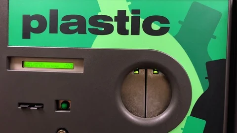 Closeup of Recycling Machine Having Plastic Bottles Inserted Stock Footage 100566057