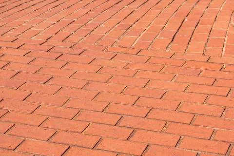 Closeup of red brick patterns and textures on walkway Stock Photos