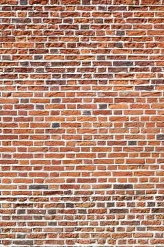Closeup of a red brick wall background Stock Photos