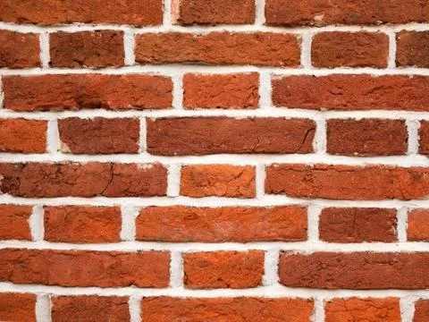 The closeup of the red brickwall as a background. Stock Photos