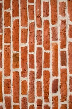The closeup of the red brickwall as a background. Stock Photos