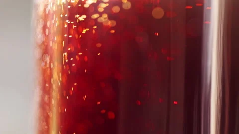 Closeup of red coloured soft drink bubble Stock Footage 303327684