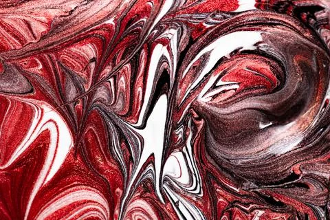 Closeup of red fluid metallic paint textured background Stock Photos