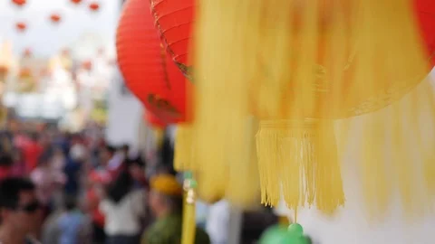 Closeup of red lanterns during the Chinese New Year on the crowd background Video stock 117753440