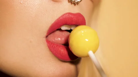 Closeup red lips of young beautiful hipster bad girl with earring in her nose Stock Footage 142147228