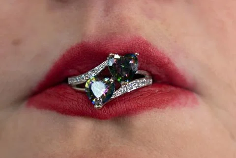 Closeup red lipstick with candy Stock Photos