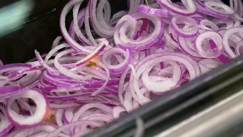 Closeup red onion circle on black box fast food shop Stock Footage 80986830