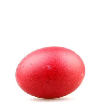 Closeup of a red painted egg for Easter under the lights isolated on a white Stock Photos