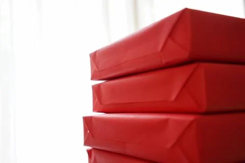 Closeup red present boxes with white background Stock Photos