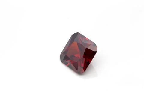 Closeup of a red ruby gemstone isolated on a white background Foto stock