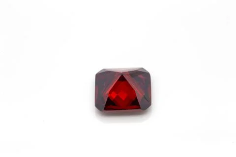 Closeup of a red ruby gemstone isolated on a white background 写真素材
