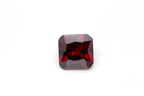 Closeup of a red ruby gemstone isolated on a white background Foto stock