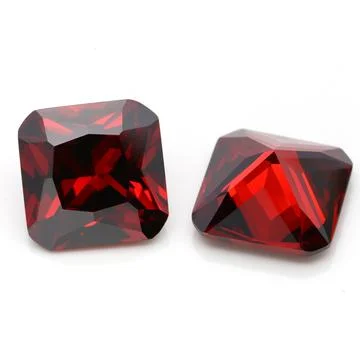Closeup of red ruby gemstones isolated on a white background Stock Photos