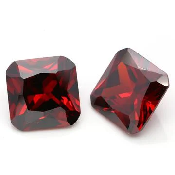 Closeup of red ruby gemstones isolated on a white background 스톡 사진