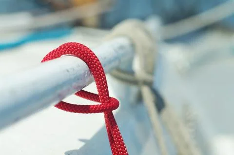 Closeup of red thin short line used for any yacht Stock Photos