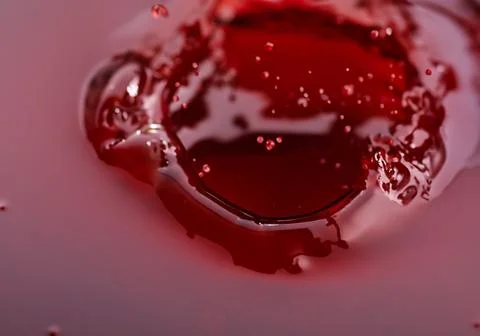 Closeup red wine surface Stock Photos