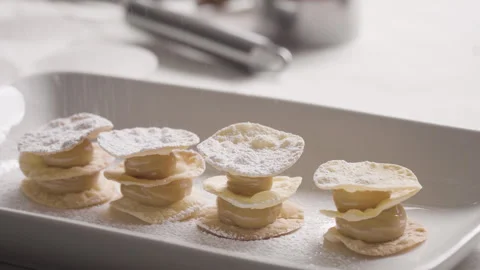 Closeup of refined sugar falling from the sifter Stock Footage 240236540