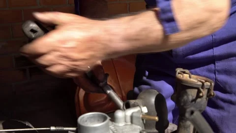 Closeup of the restoration process for a vintage car engine, mechanical work. Stock Footage 309239903