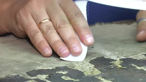Closeup of Restorer working on the old icon at workshop. Stock Footage 141798090