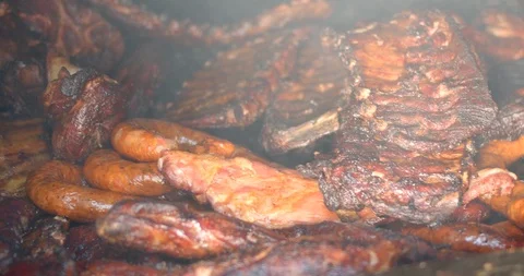 Closeup, Ribs Cooking in Outdoor Southern Barbecue 4K Stock Footage 115043553