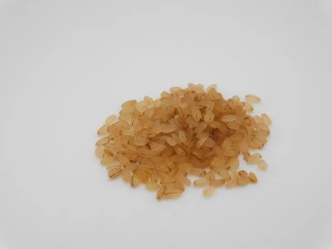 Closeup of rice's isolated on white background Stock Photos