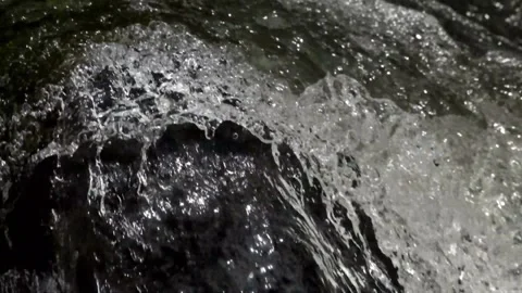 Closeup of river water cascade with clear,clear water flowing fast between rocks Stock-Footage 292666759