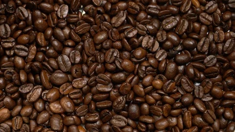 Closeup of roasted coffee beans poured Stock Footage 121640757