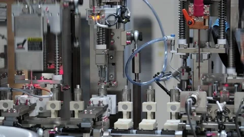 Closeup of a Robot Pressing Down in an Industrial Automation Facility 8K Stock Footage 220337491