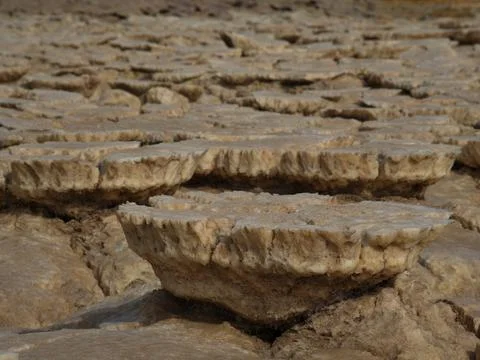 Closeup of rock patterns dried earth forming a Mars like landscape Stock Photos