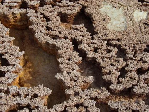 Closeup of rock patterns forming a background Mars like landscape Danakil Stock Photos