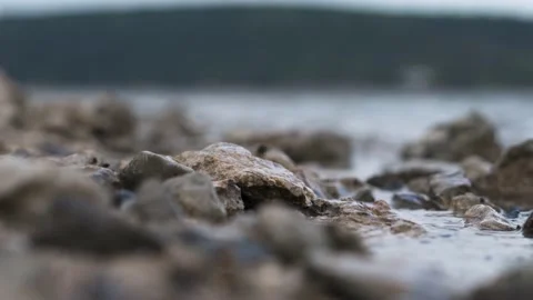 Closeup of rocks on the beach Stock Footage 157283869