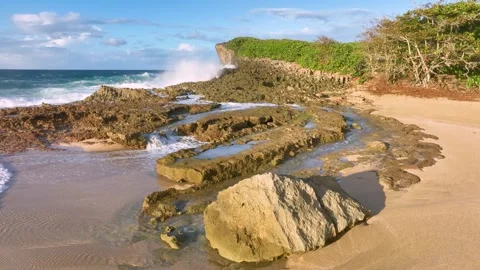 Closeup of the rocks, tidal pools, and waves along the Puerto Rico coast. Video stock 266431507