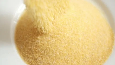 Closeup rotating video of corn flour in a bowl. Stock Footage 322513959