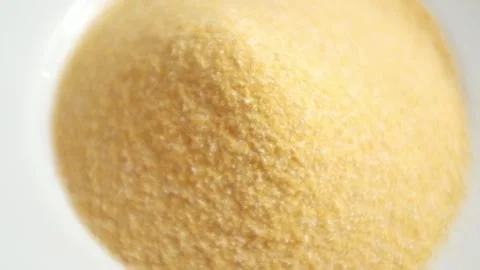 Closeup rotating video of corn flour in a bowl. Stock Footage 322513992