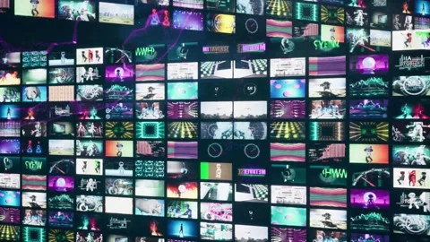 Closeup rotation with many small video album animations. Collage or montage  Stock Footage 267817528