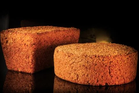 Closeup round and rectangular rye bread with sesame seeds Fotos de archivo