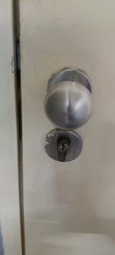 Closeup of round door handle Stock Photos