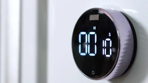 Closeup of round kitchen electronic and mechanical timer is from 15 seconds to 0 Stock Footage 150836601
