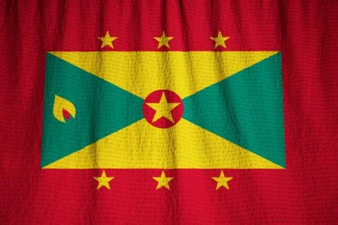 Closeup of Ruffled Grenada Flag, Grenada Flag Blowing in Wind Stock Photos
