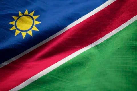 Closeup of Ruffled Namibia Flag, Namibia Flag Blowing in Wind Stock Photos