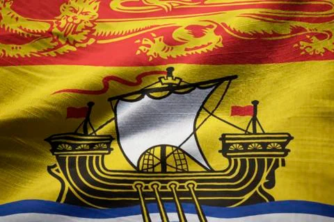 Closeup of Ruffled New Brunswick Flag, New Brunswick Flag Blowing in Wind Stock Photos