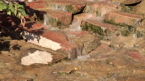 Closeup of running water stream over rocks. Vídeos de archivo 45009532