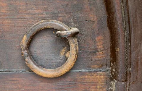 Closeup of rusted ring door knocker Stock Photos