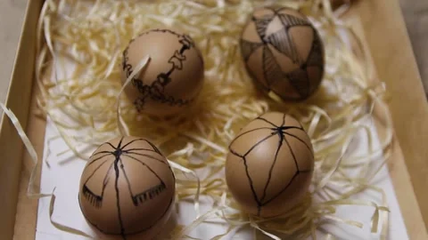 Closeup rustic easter eggs on craft background. Easter craft box with brown e Stock Footage 170346131