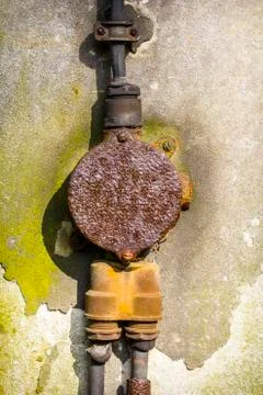 Closeup of a rusty old junction box on a wall Stock Photos